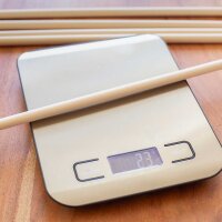 Weighing of the Wooden Shaft